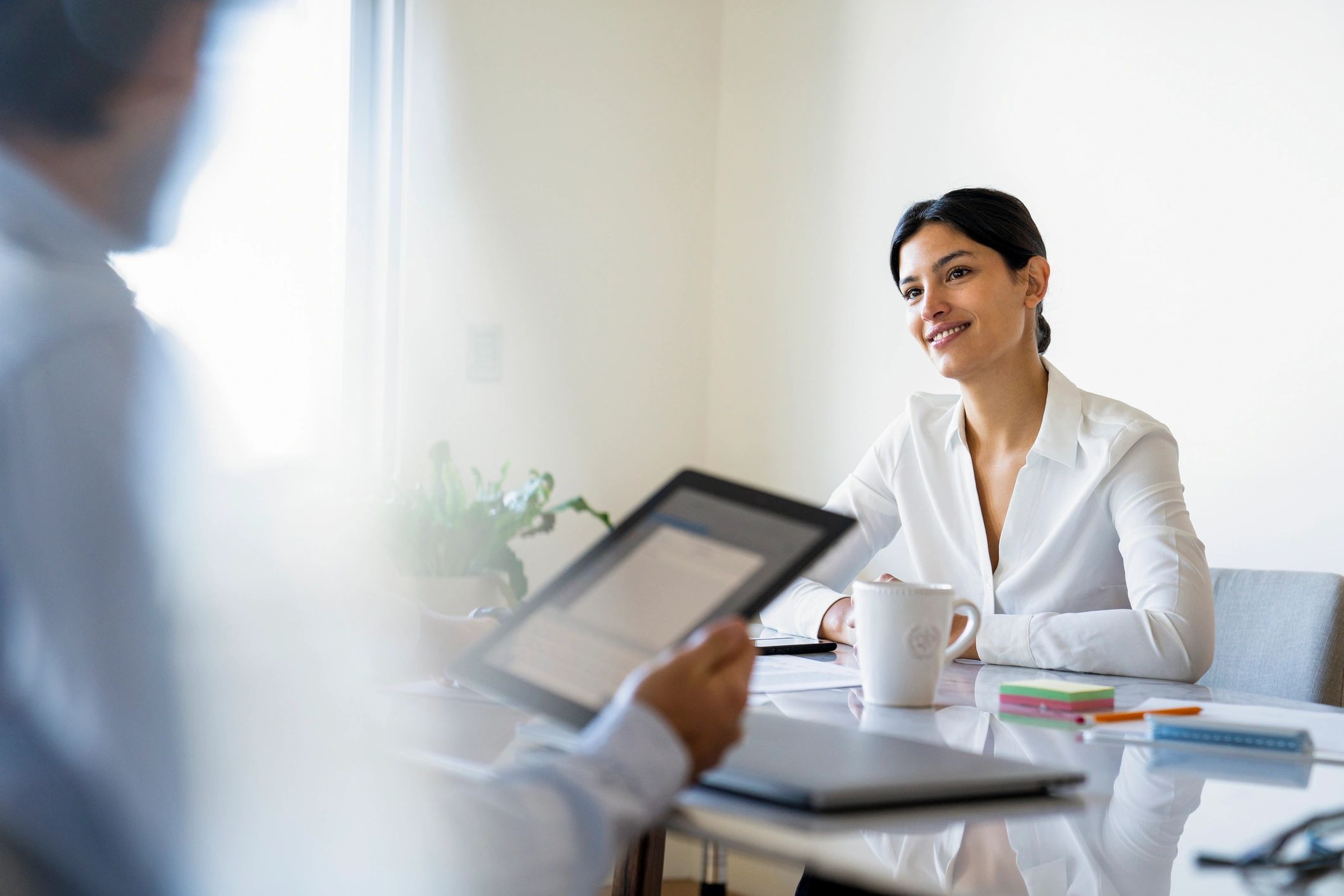 Talent sourcing coordinator in a business meeting