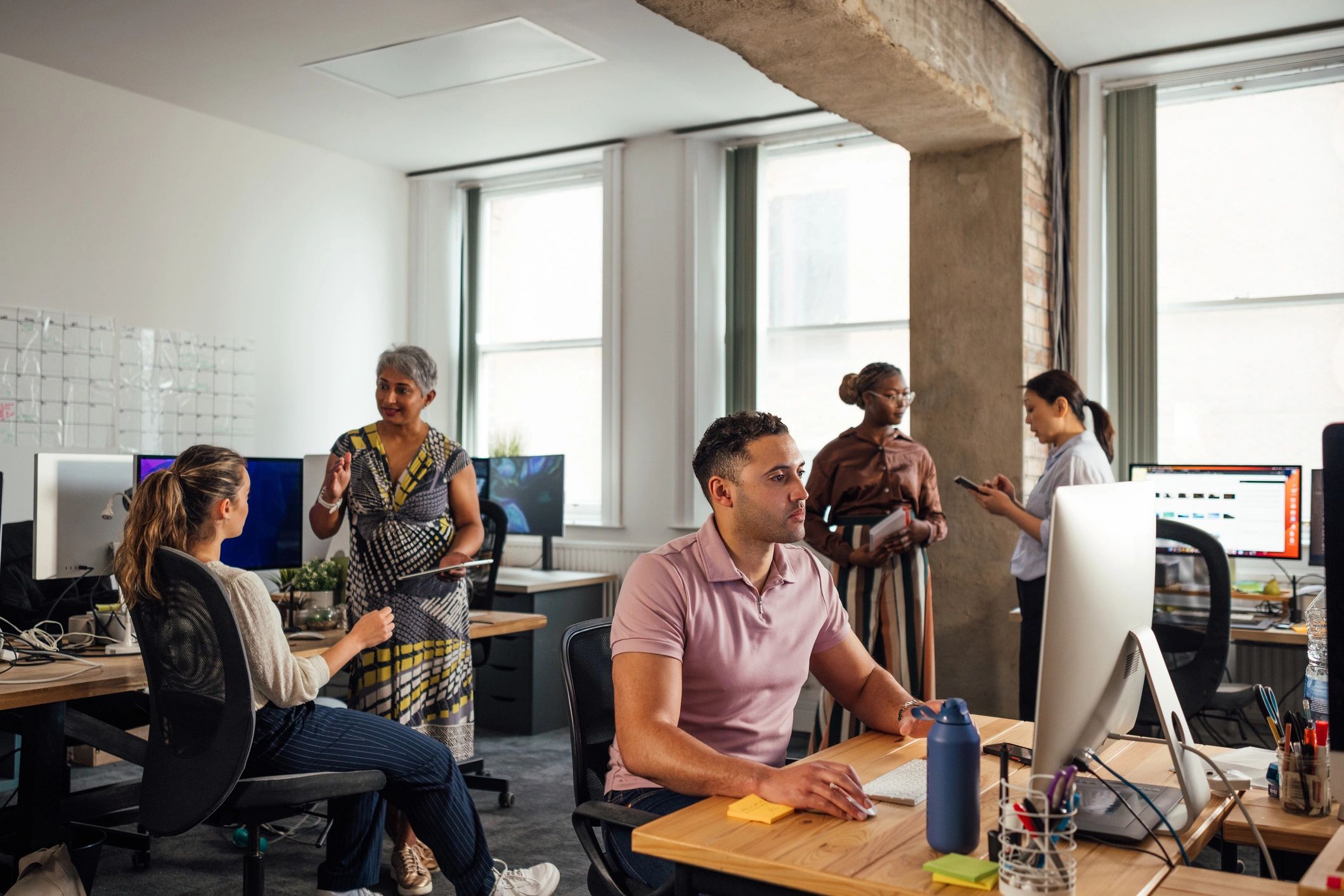 Recruitment team working together in an office